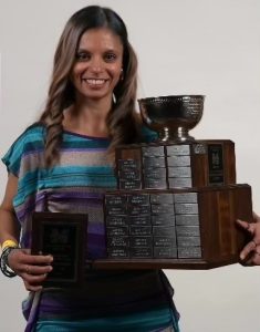 Stephanie Fernandes posing beside the Windsor Flash Trophy