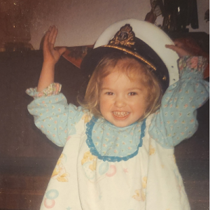 Kathryn Reeve as a toddler, with her father's military cap on