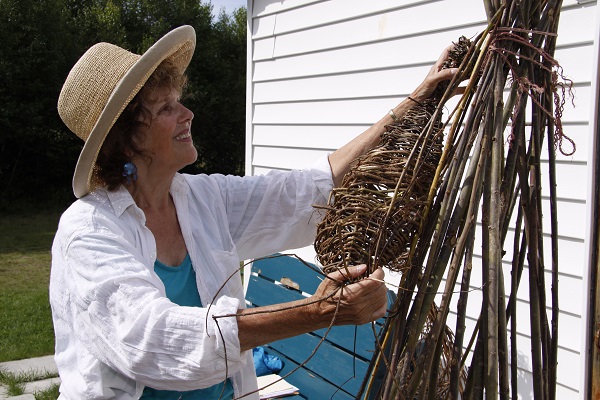 Dawn MacNutt working on a art piece