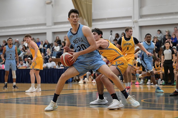 Keigan Feron on the Basketball court for the MSVU Men's Basketball Team