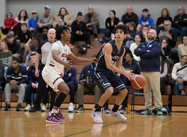 Kyan Feron, playing for the MSVU Men's Basketball team