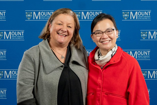 Dr. Janice Keefe and graduate student Lanlan Xin in front of an MSVU backdrop